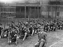 Elementary school students in Imperial Japan were given military drills, May 1942 Elementary school students were given military drills (Nakameguro National School in Tokyo), 1942.jpg