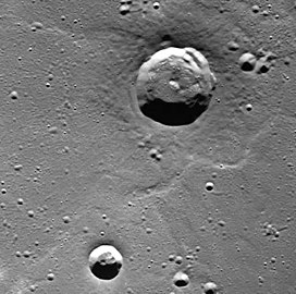 Mendelssohn crater interior. The crater at top is associated with a dark spot and contains hollows