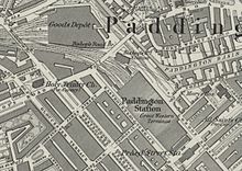 A map showing Paddington mainline station aligned diagonally north-west to south-east amongst streets of houses. Smaller, Metropolitan Railway stations are to the north and south and a goods station is located to the north of all of these