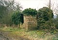 Oxfordshire Ironstone Railway's OIR P-hut at Drayton, Oxfordshire in 2005. At the far right is a pile of rubble was ware a signal post used to be.