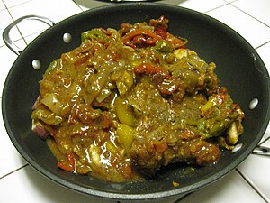English: Carne Pizzaiola, in a non-stick pan