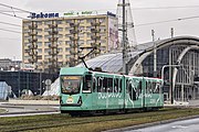 Modernized 2018 Duewag Ptm with rolling stock number #904 heads towards the market in Katowice, Poland.