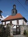 Evangelische Kirche mit Ausstattung, Kirchhof/Friedhof und Einfriedung