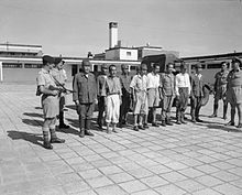 Japanese war criminals prepare for their transfer to Stanley Prison on 29 September 1945 JapaneseWarCriminalsHK.jpg