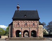 Lorsch Abbey gatehouse, c. 800, an example of the Carolingian architectural style - a first, albeit isolated classical movement in architecture Kloster Lorsch 07.jpg