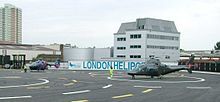Лондонская вертолетная площадка - Баттерси - Лондон - 2 вертолета ждут взлета - вечер - 030604.jpg