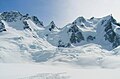 Pioneer Peak (left) and Adamant Mountain (right). "The Stickle" is the pinnacle between them.