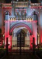 Portal of the church illuminated at night