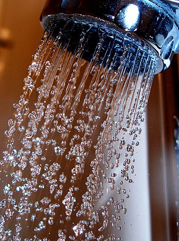 water stream from shower in close-up, showing ...