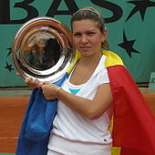 Halep posing with the French Open trophy