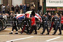Margaret Thatcher's coffin being carried on a 13-pounder gun carriage in 2013. Thatchers funeral 5D3 0188.jpg