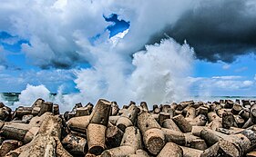 Cement beach reinforcements in on the coast of Alexandria, Egypt to prevent further erosion of coastline that is vulnerable to subsidence. Waves Touching The Clouds.jpg