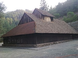 Panagia Tou Araka, showing the steep-sided wooden roofs of many of the smaller churches