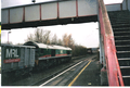 A picture of a Mendip Rail train passing trough Aldermaston station in Aldermaston, Berkshire in the year 2005