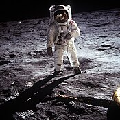 Buzz Aldrin walks on the surface of the Moon during Apollo 11.