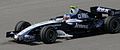 Alexander Wurz driving the Williams FW29 at the 2007 Malaysian GP. The livery remained the same, with Lenovo replacing HP