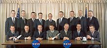 The first sixteen NASA astronauts to be selected, February 1963. Back row: White, McDivitt, Young, See, Conrad, Borman, Armstrong, Stafford, Lovell. Front row: Cooper, Grissom, Carpenter, Schirra, Glenn, Shepard, Slayton. Astronaut Groups 1 and 2 - S63-01419.jpg