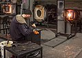 Image 76Glass blower. This was moments before he accidentally dropped it. Heartbreaking (and vasebreaking). Talented folks here, though, and I actually went back a while later and took a class. Got a piece of lit up frozen spaghetti to prove it.