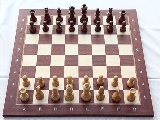 Chess board with chess set in opening position