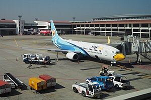 Boeing 737-800 Nok Nok (HS-DBK) poháněný na mezinárodním letišti Don Mueang