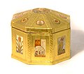 An octagonal casket decorated in gilt gesso.
