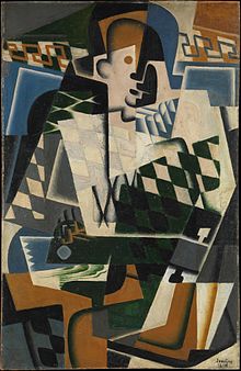 Juan Gris, 1917, Arlequin a la Guitare (Harlequin with a Guitar), oil on panel, 101 x 65.1 cm, Metropolitan Museum of Art Juan Gris - Harlequin with a Guitar.jpg