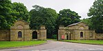 West Lodges with Gates Gatepiers and Flanking Walls