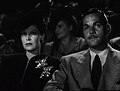 Avec Alan Curtis, dans Les Mains qui tuent (1944)