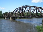 A typical steel truss railway bridge.