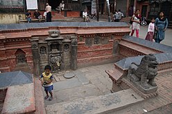 Sundhara in Patan. On the right side of the spout is the jahru.
