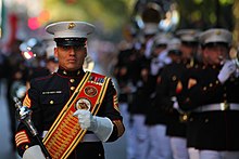 The 2nd Marine Aircraft Wing Band marches down New York's Fifth Avenue during the 2010 Columbus Day Parade. In 2007 the band was deployed to Iraq to provide security at a tactical air control center. 2nd Marine Aircraft Wing Band.jpg