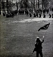 Student Alan Canfora waves a black flag before the Ohio National Guard shortly before the armed forces opened fire Alan Canfora Kent State LIFE May 15, 1970.jpg