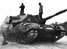 The Leopard 1A3 received a new, welded turret which can be distinguished by its angular shape. Seen here is a vehicle of PzGrenBtl 301 in 1984. BW 1984 HamburgUebung 020.jpg