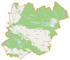 Mapa konturowa gminy Bierzwnik, na dole po lewej znajduje się owalna plamka nieco zaostrzona i wystająca na lewo w swoim dolnym rogu z opisem „Jezioro Krzywe”
