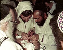 Preparing for a Jewish ritual circumcision. Brit mila.jpg