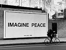Billboard displaying Yoko Ono's artwork Imagine Peace Imagine Peace - Yoko Ono - Hornsey Road, London - 2022 - monochrome.jpg