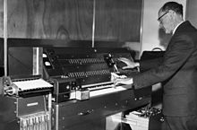 Israeli composer Josef Tal at the Electronic Music Studio in Jerusalem (c. 1965) with Hugh Le Caine's Creative Tape Recorder (a sound synthesizer) aka "Multi-track" Josef Tal - LeCaine Creative.jpg