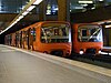 Two trains of Lyon Metro Line D at Gorge de Loup station in 2009