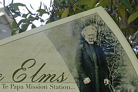 Photo of Alfred Brown on the sign for The Elms - Formerly the Te Papa Mission Station.