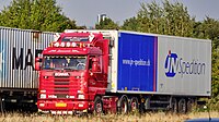 Scania R143M 420 trekker met oplegger