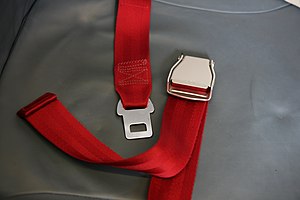 Seat belt on an airplane, open