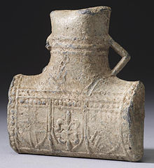 A pilgrim's flask, carried as a protective talisman, containing holy water from the shrine of Thomas Becket in Canterbury Cathedral English - Pilgrimage Flask from the Shrine of Thomas Becket in Canterbury - Walters 5599 - View B.jpg