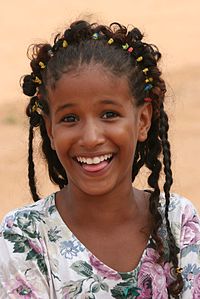 Een smieljend Wucht uut Bareina, Mauretanien