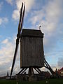 Stalijzermolen met Sint-Martinuskerk op achtergrond