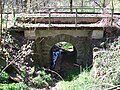 Sachgesamtheitsbestandteil der Sachgesamtheit Muldentalbahn, Teilabschnitt Limbach-Oberfrohna, Stadt, OT Wolkenburg-Kaufungen mit den Einzeldenkmalen: Brücke (siehe Einzeldenkmal 09306102), Brücke (siehe Einzeldenkmal 09306105), Bahndamm (siehe Einzeldenkmal 09242694), Bahnwärterhäuschen (siehe Einzeldenkmal 09306114) und den Sachgesamtheitsteilen: Eisenbahnbrücke und Durchlass (siehe auch Sachgesamtheit 09306181)