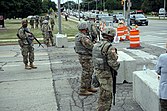 National guard troops stand behind barricades in Kenosha Wisconsin.jpg