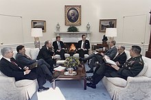 Bush meets with Robert Gates, General Colin Powell, Secretary Dick Cheney and others about the situation in the Persian Gulf and Operation Desert Shield, January 15, 1991 President Bush meets with General Colin Powell, General Scowcroft, Secretary James Baker, Vice President Quayle... - NARA - 186429.jpg