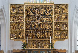 Fastuoso altar esculpido por Claus Berg.