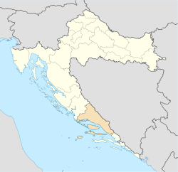 Сплитско-далматинската Жупанија (портокалова боја) во Хрватска (жолта боја)
