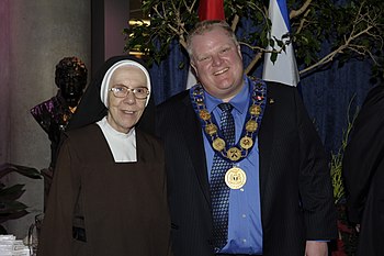Rob Ford greeting a nun at the Mayor's 2011 Le...